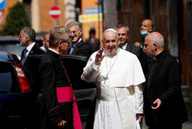 FILE PHOTO: Pope Francis leaves after leading a Mass and the Regina Coeli prayer in Rome’s Santo Spirito in Sassia church, in Rome