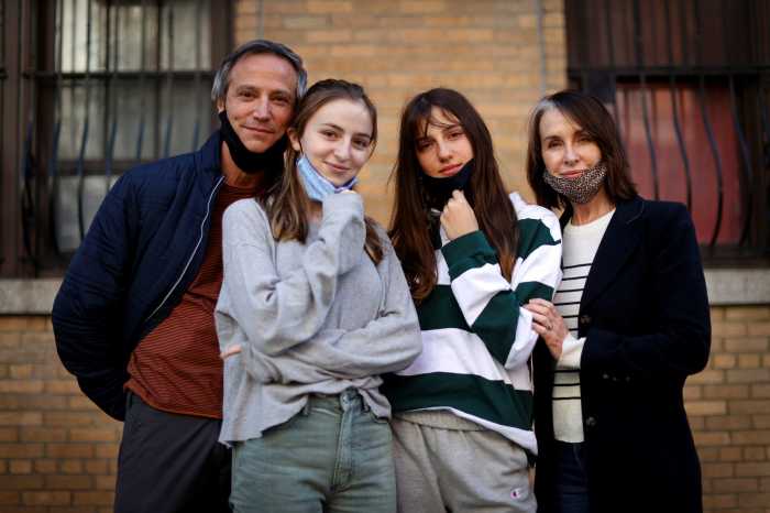 Maree Johnson-Baruch, a Broadway performer, poses with her family, husband Jason and teenage daughters Audra and Helena