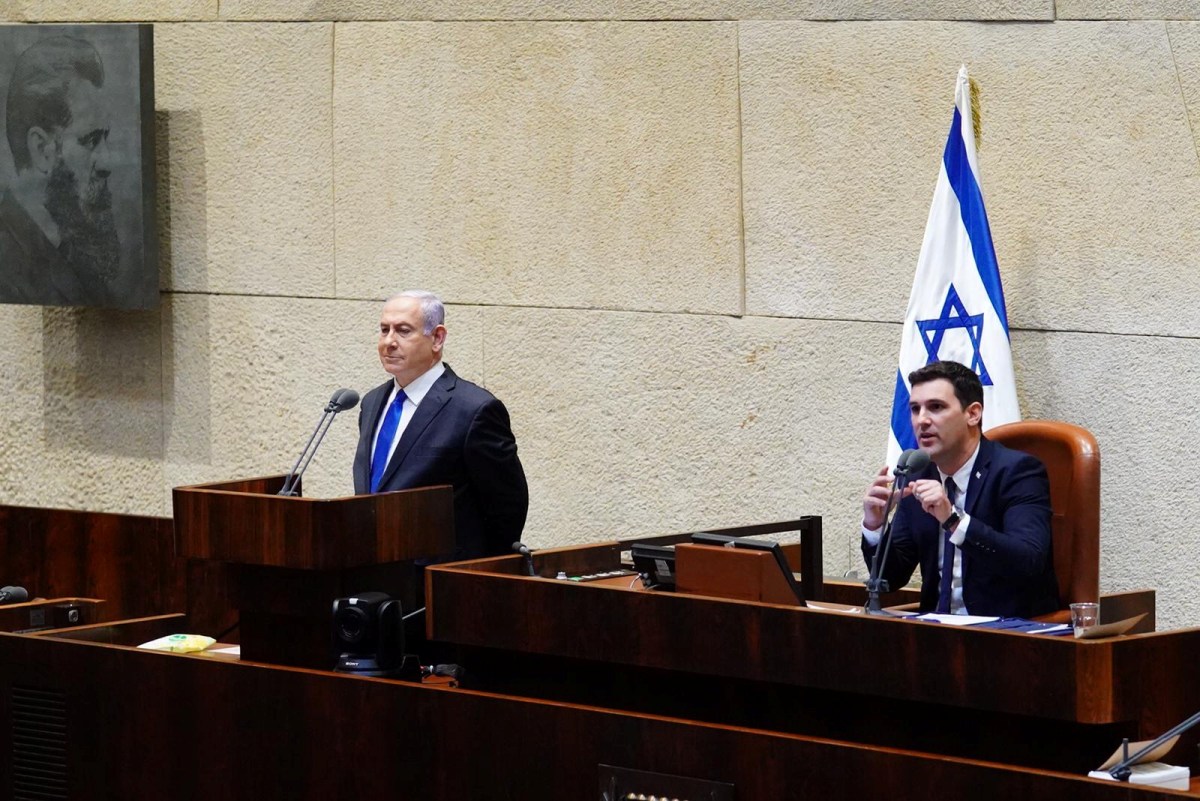 Israeli Prime Minister Netanyahu speaks during a swearing in ceremony of his new unity government at Israel’s parliament in Jerusalem