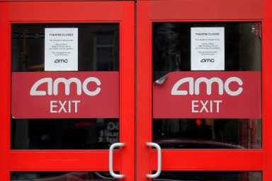 FILE PHOTO:  Closed signs are seen on an AMC Theatre during the outbreak of the coronavirus disease (COVID-19), in New York