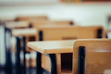 Back to school concept. School empty classroom, Lecture room with desks and chairs iron wood for studying lessons in highschool thailand without young student, interior of secondary education