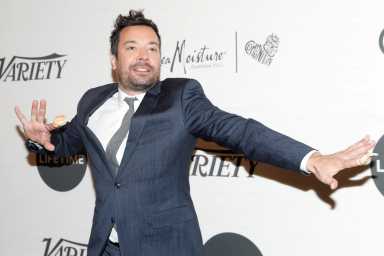 FILE PHOTO: Comedian Jimmy Fallon poses on the red carpet at the 2019 Variety’s Power of Women event in New York
