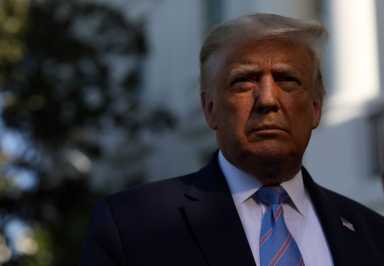 U.S. President Donald Trump boards Marine One to depart for travel to Texas from the South Lawn of the White House