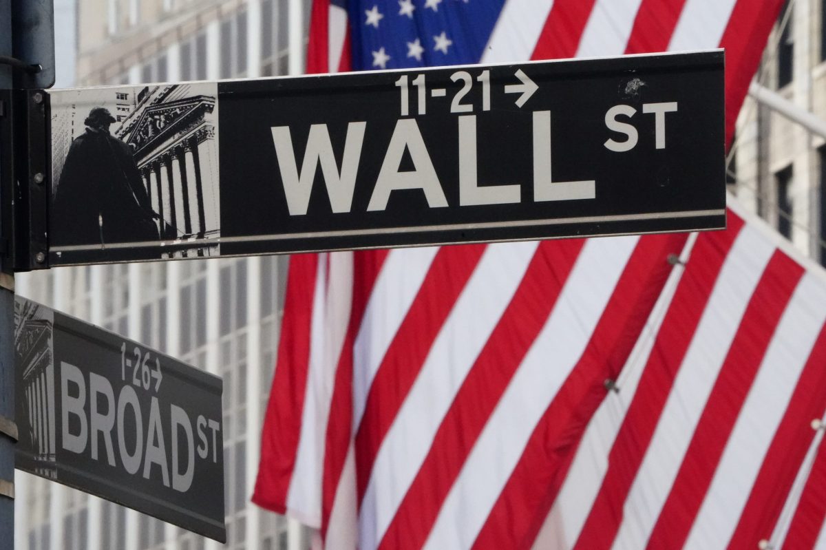 The Wall Street sign is pictured at the New York Stock exchange (NYSE) in the Manhattan borough of New York City