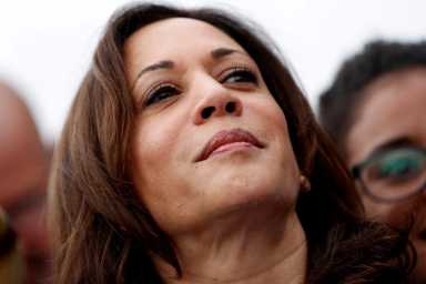 FILE PHOTO: U.S. Democratic presidential candidate and U.S. Senator Kamala Harris joins with striking McDonalds workers in Las Vegas