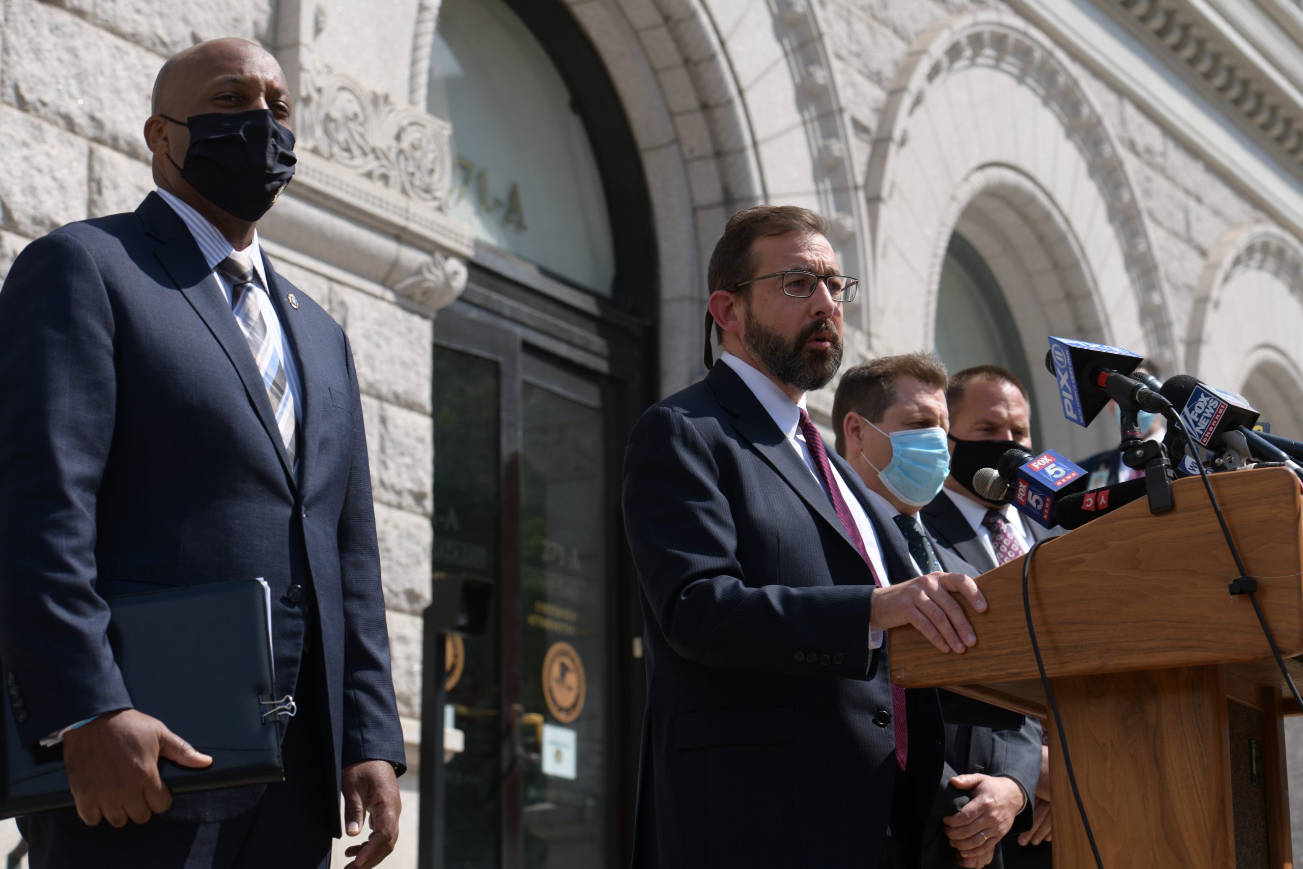 Chief of detectives Rodney Harrison and Acting Eastern District US Attorney Seth DuCharme