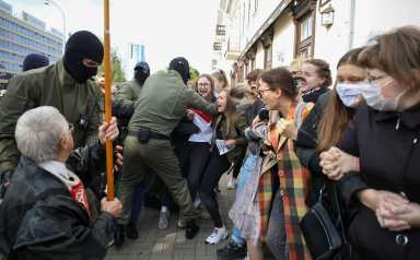 Women take part in a rally against police brutality following protests to reject the presidential election results in Minsk