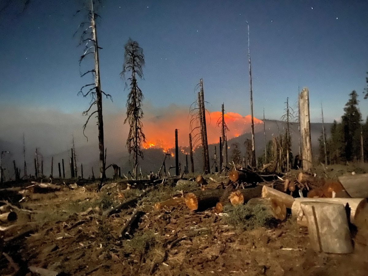 Flames appear on a hillside during the Elkhorn Fire near Red Bluff