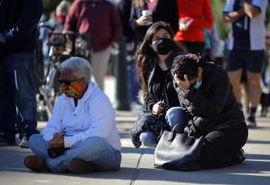 People gather in front of the U.S. Supreme Court following the death of U.S. Supreme Court Justice Ruth Bader Ginsburg, in Washington