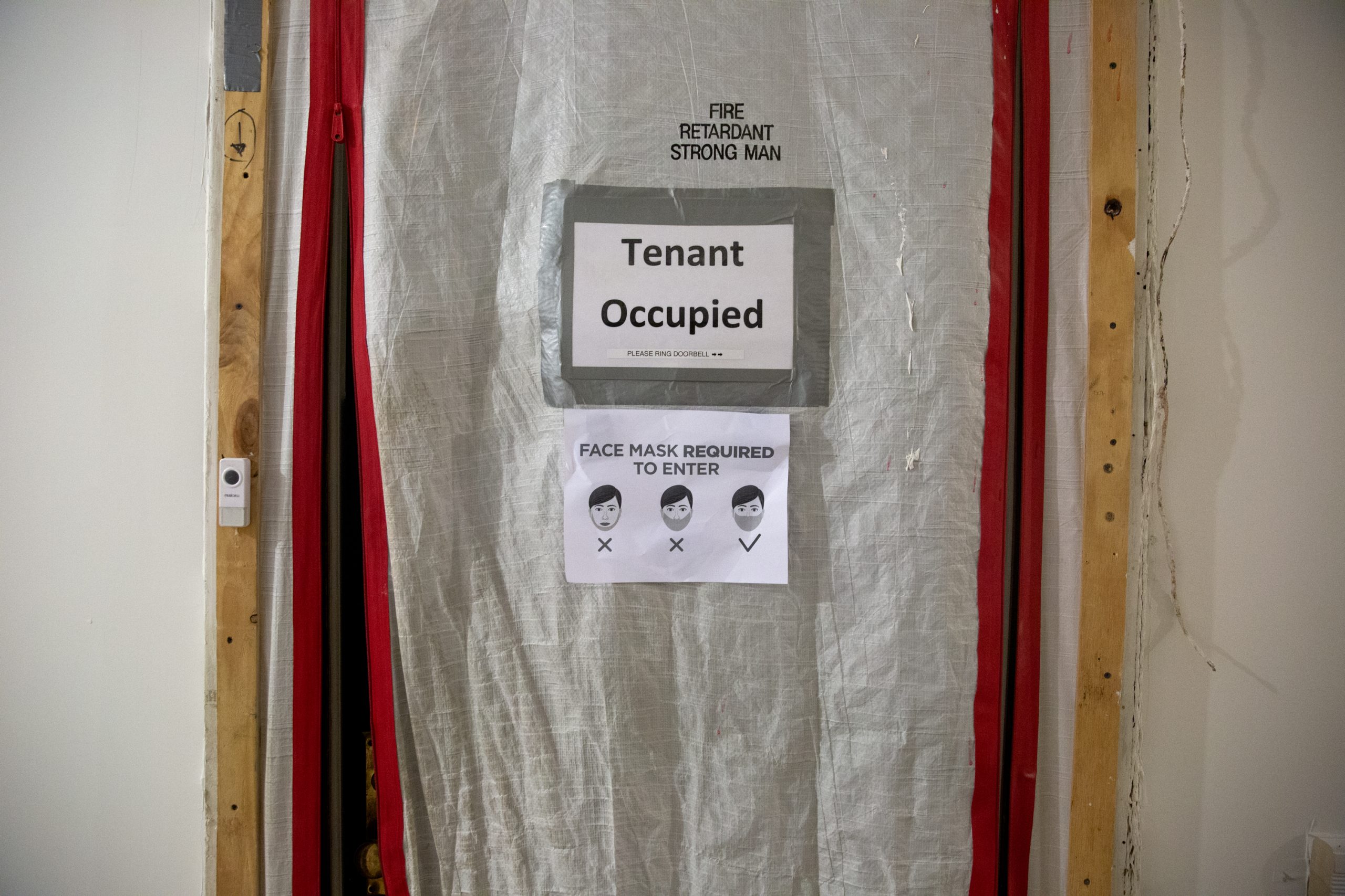 Tenants inside the Chelsea Hotel try to protect their apartments from noxious particles from construction
