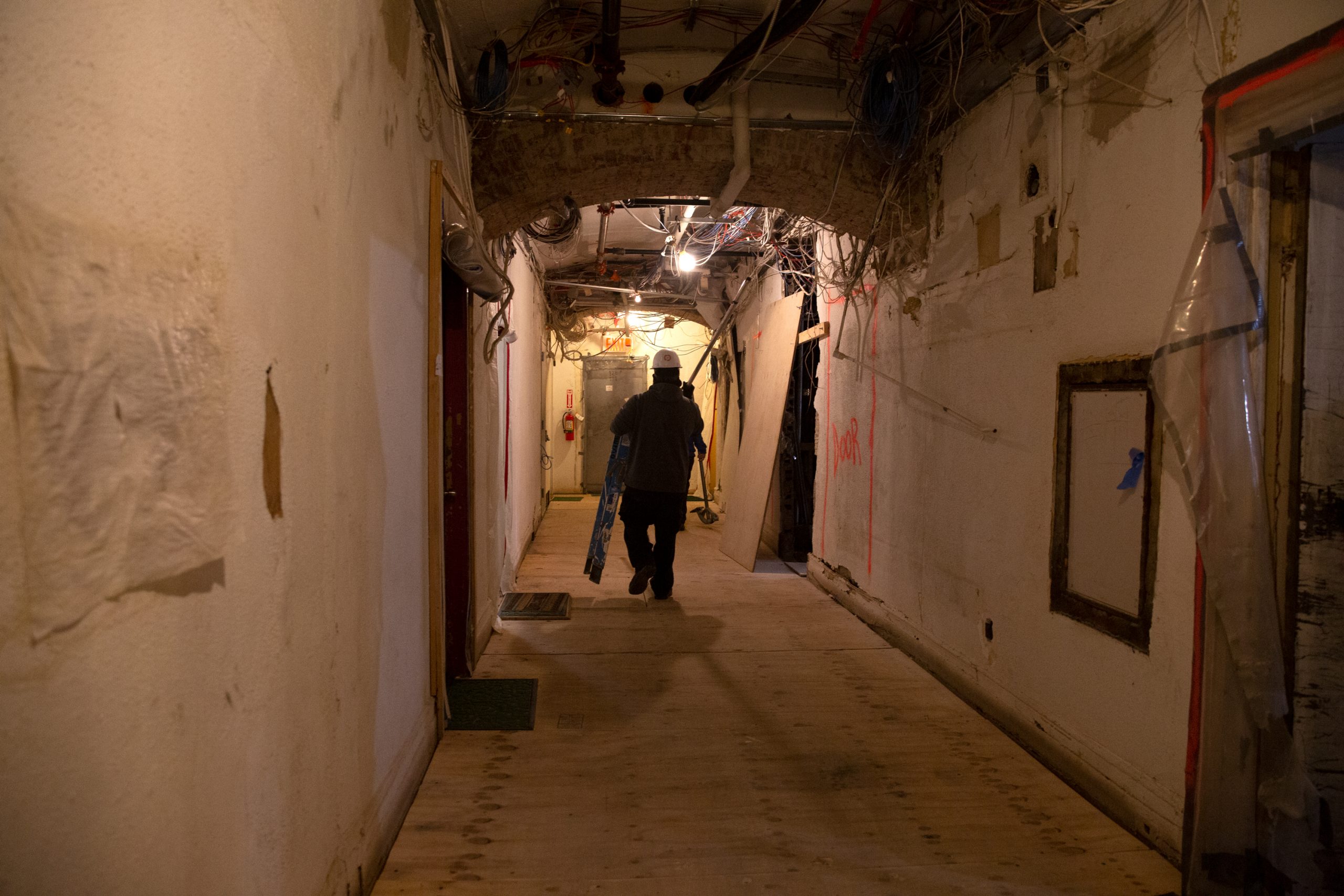 A construction worker inside the Chelsea Hotel.