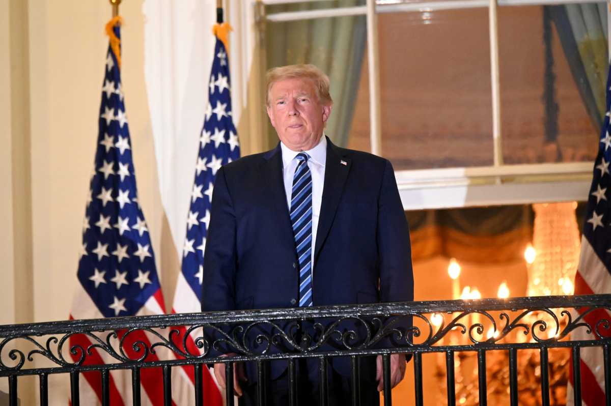 FILE PHOTO: U.S. President Donald Trump returns to the White House after being hospitalized at Walter Reed Medical Center for coronavirus disease (COVID-19)