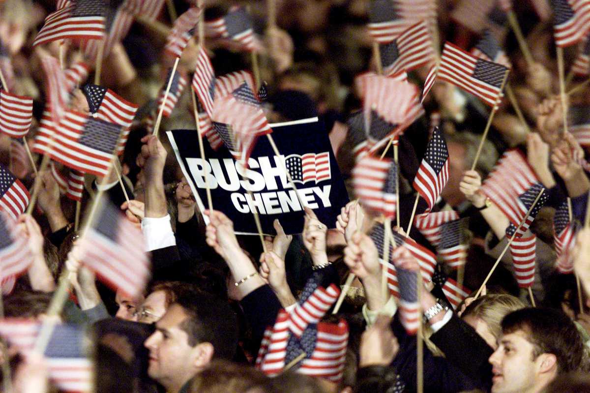FILE PHOTO: Republican supporters react after tv networks announced that Texas Governor George W. Bush won the U.S. election in Austin