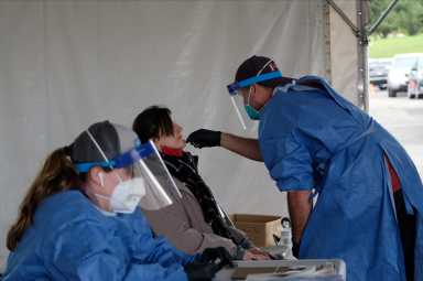 People line up to get COVID-19 tests in Milwaukee