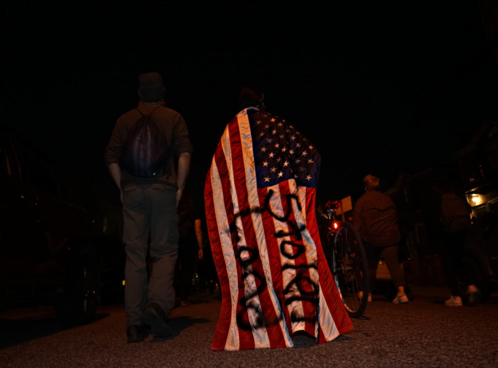 Protesters march from Brooklyn to Queens against police unions and QAnon 13