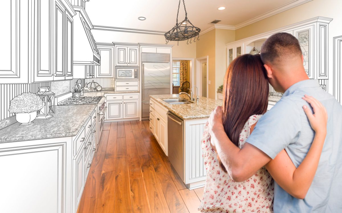 Young Military Couple Inside Custom Kitchen and Design Drawing