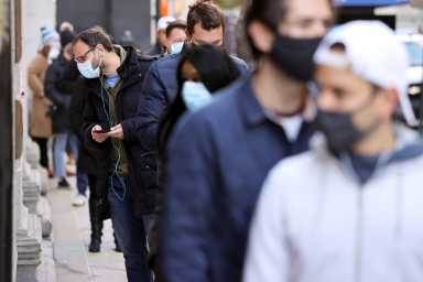 Voters line up at a polling station to vote in the 2020 U.S. presidential election in Philadelphia