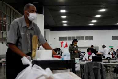 Votes continue to be counted at the TCF Center the day after the 2020 U.S. presidential election, in Detroit, Michigan