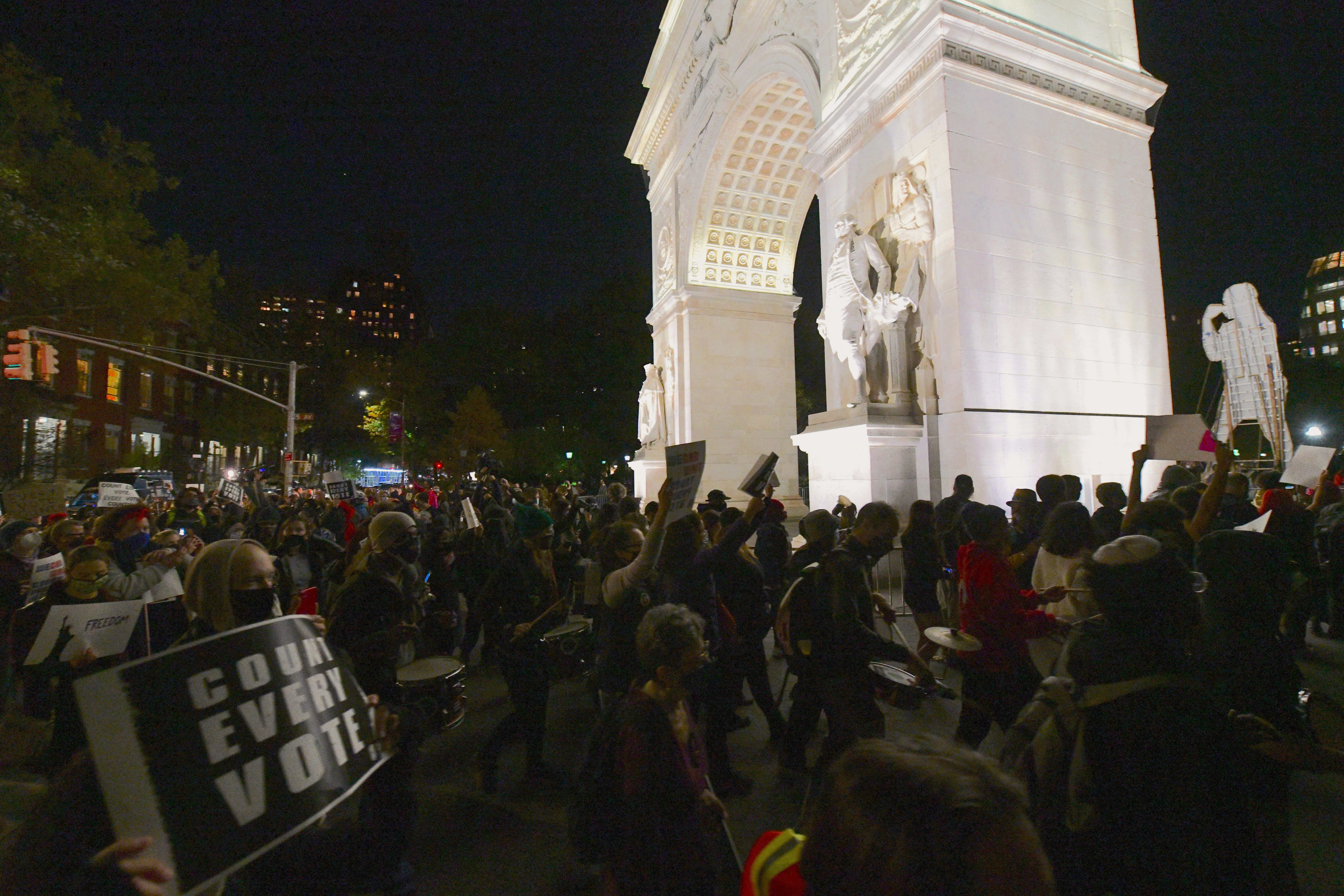 Anti-Trump groups protest president's false victory call in Midtown 6
