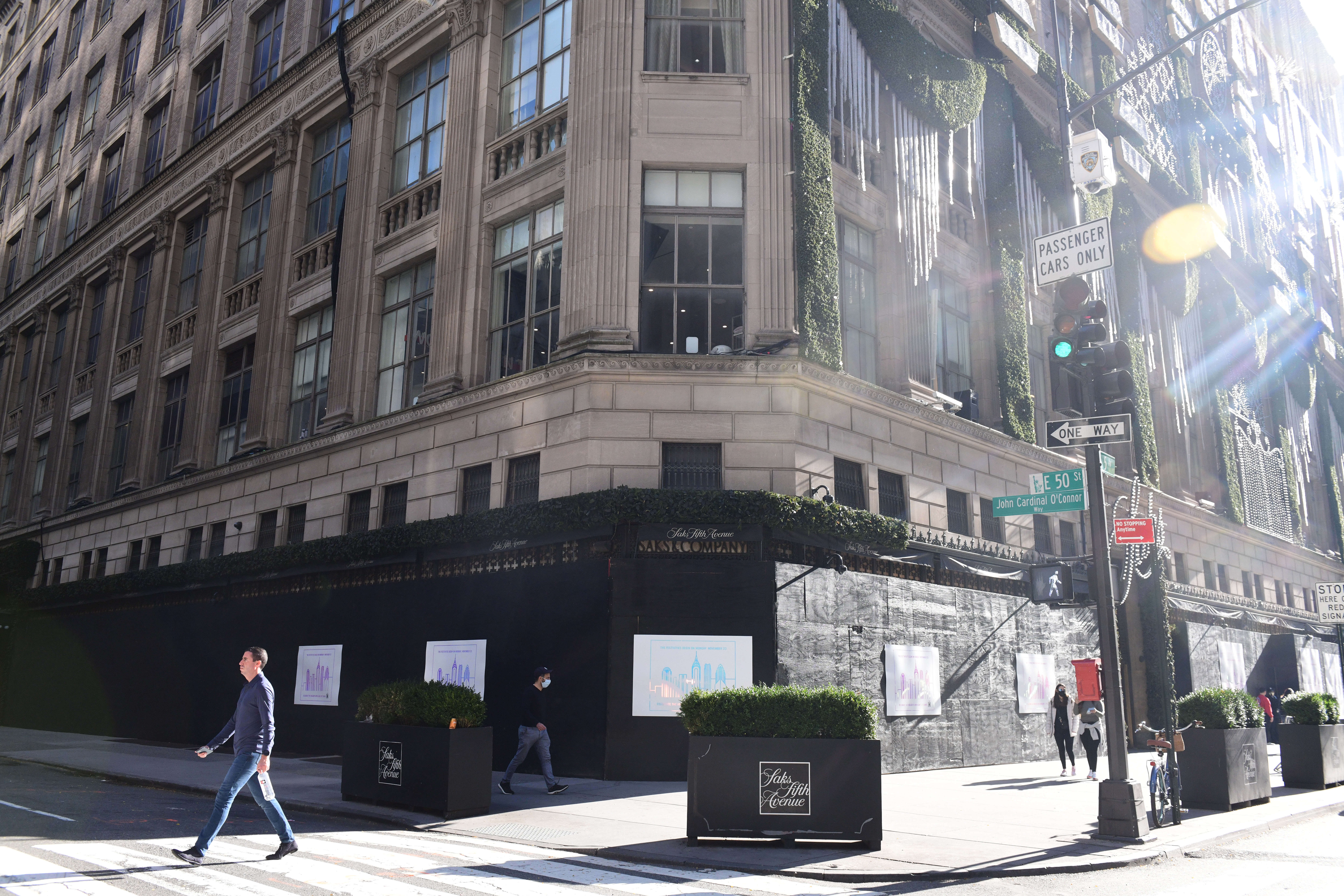 Some Manhattan store owners begin taking down wood barriers, but fear more Trump-related unrest 4