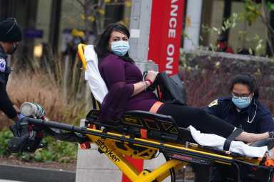 A patient is wheeled into a hospital during the coronavirus (COVID-19) pandemic