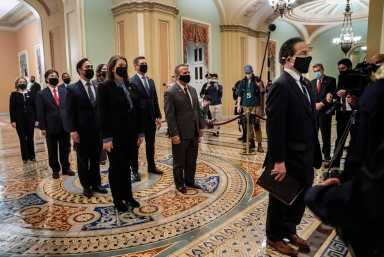 FILE PHOTO: Article of impeachment against former president Trump delivered to Senate