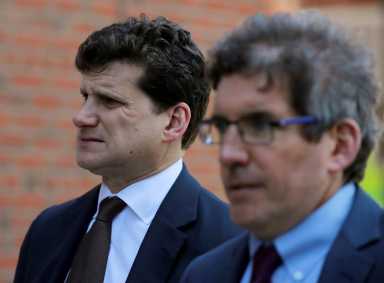 FILE PHOTO: Gordon Caplan, co-chairman of Willkie Farr & Gallagher law company, facing charges in a nationwide college admissions cheating scheme, enters federal court in Boston