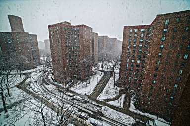 Snow falls in Stuyvesant Town.