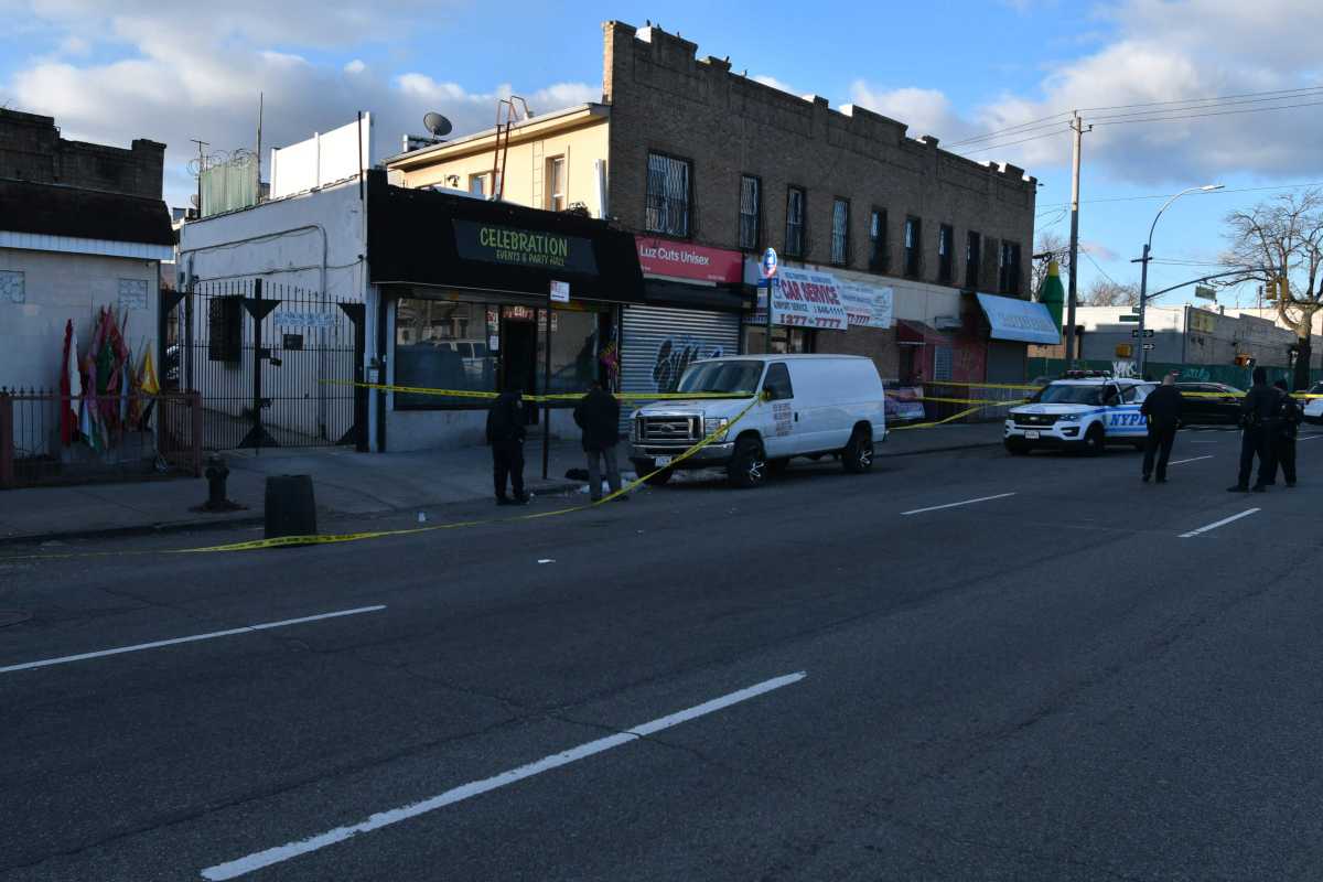 Cops investigate a deadly shooting in City Line, Brooklyn on March 7, 2021.