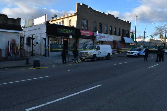 Cops investigate a deadly shooting in City Line, Brooklyn on March 7, 2021.