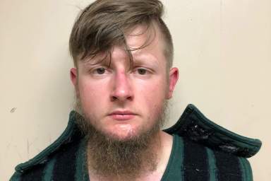 Robert Aaron Long, 21, poses in a jail booking photograph after he was taken into custody by the Crisp County Sheriff’s Office in Cordele