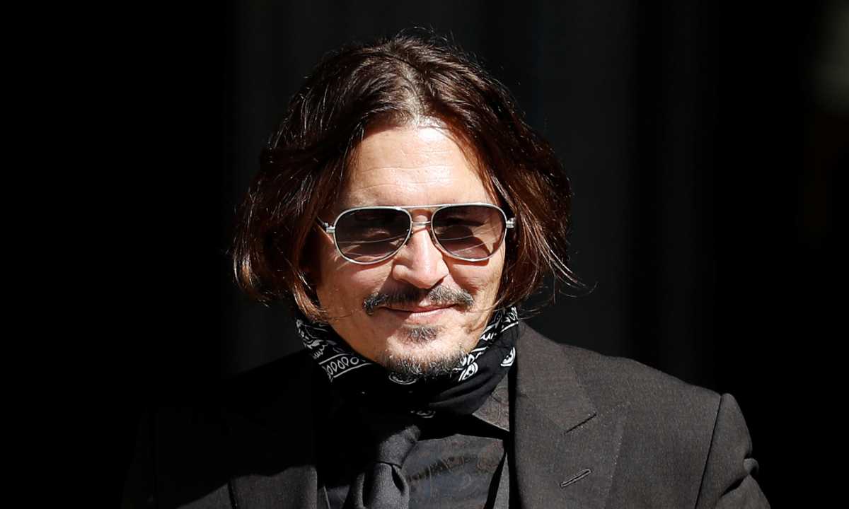 Actors Amber Heard and Johnny Depp at the High Court in London