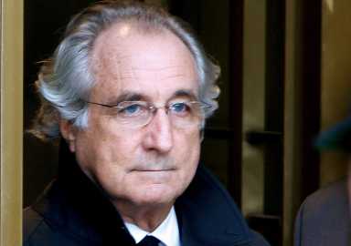 FILE PHOTO: Accused swindler Madoff exits the Manhattan federal court house in New York