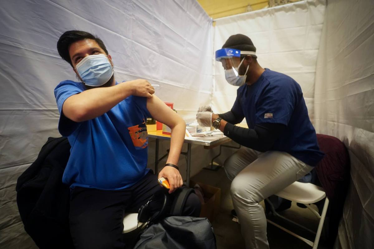 People receive vaccinations for the coronavirus disease (COVID-19) at Grand Central Station in New York