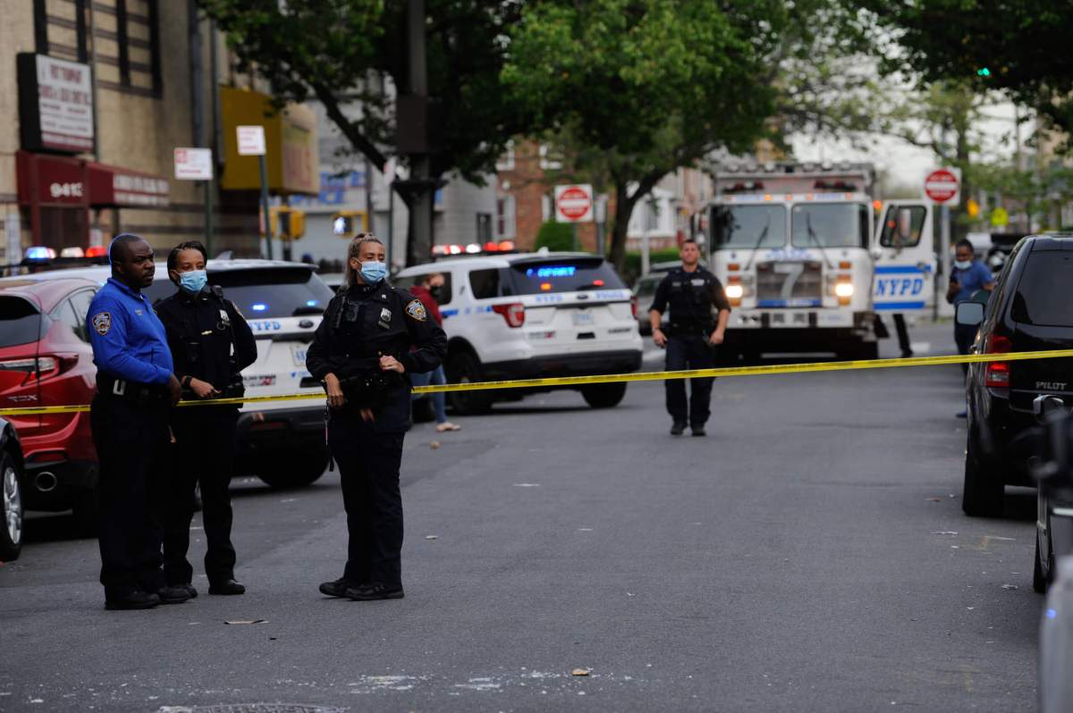 Officers from the 67 Precint investigate a shooting at 488 East 94