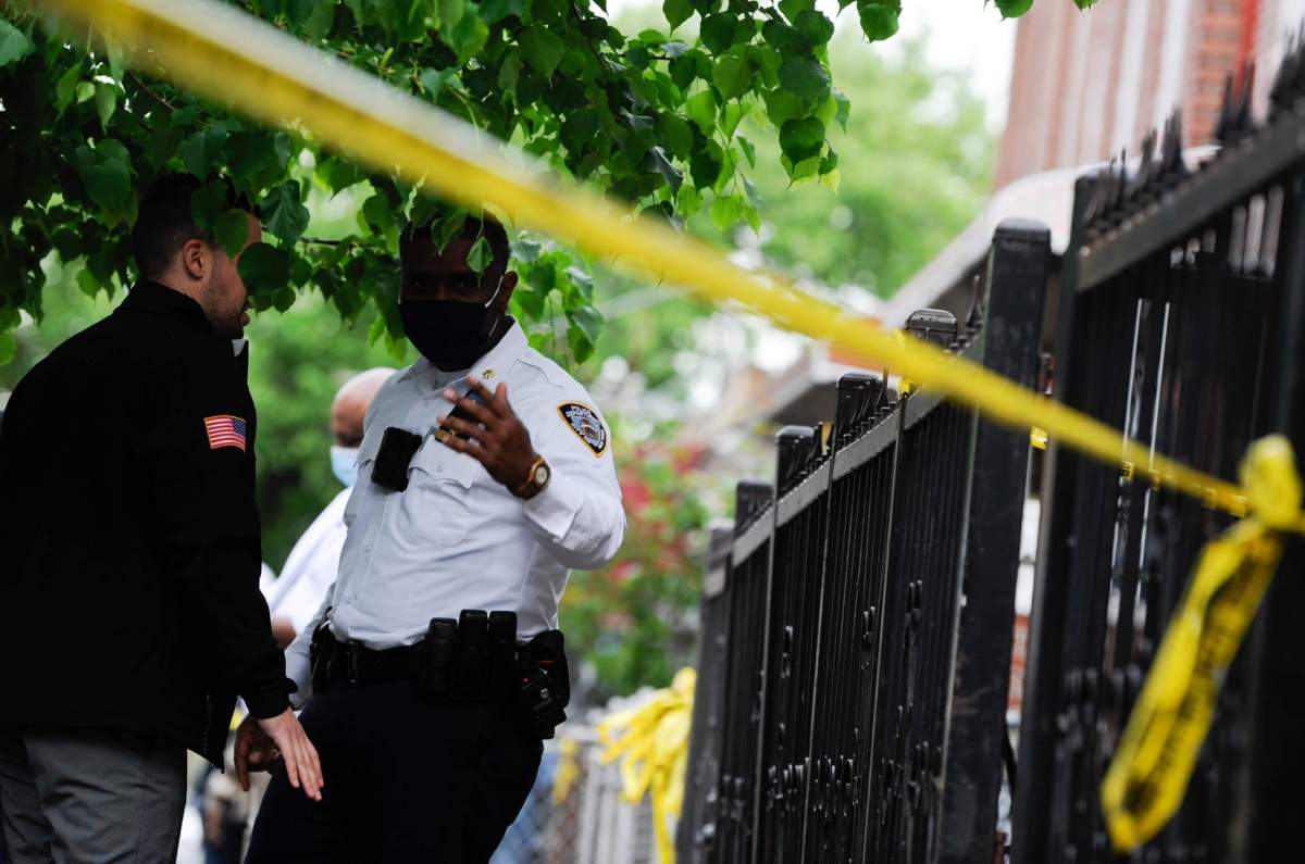 Officers from the 67 Precint investigate a shooting at 488 East 94