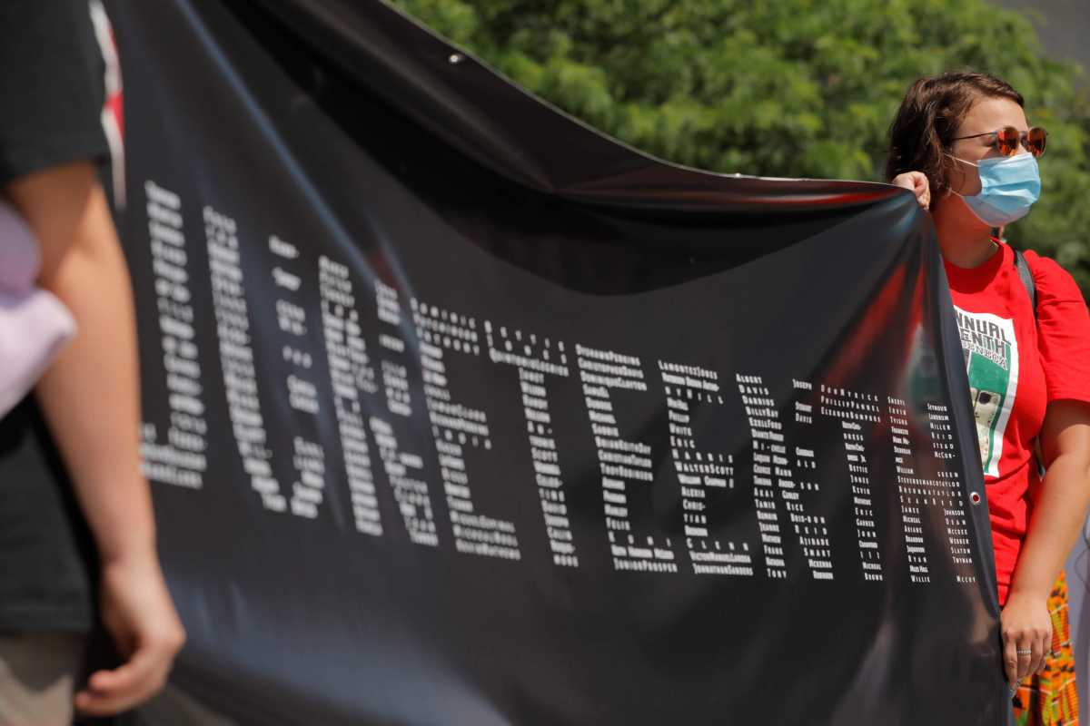 People take part in events to mark Juneteenth, which commemorates the end of slavery in Texas, in New York