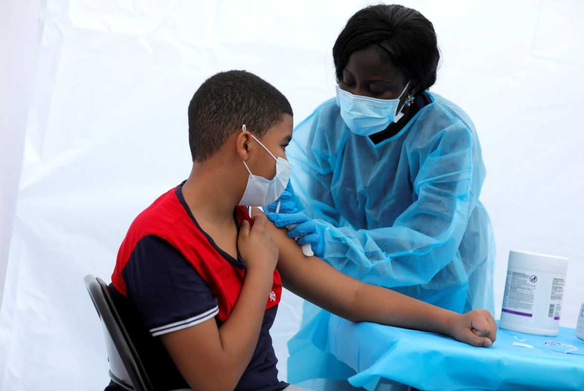 FILE PHOTO: Coronavirus disease (COVID-19) vaccination event outside the Bronx Writing Academy school in New York City