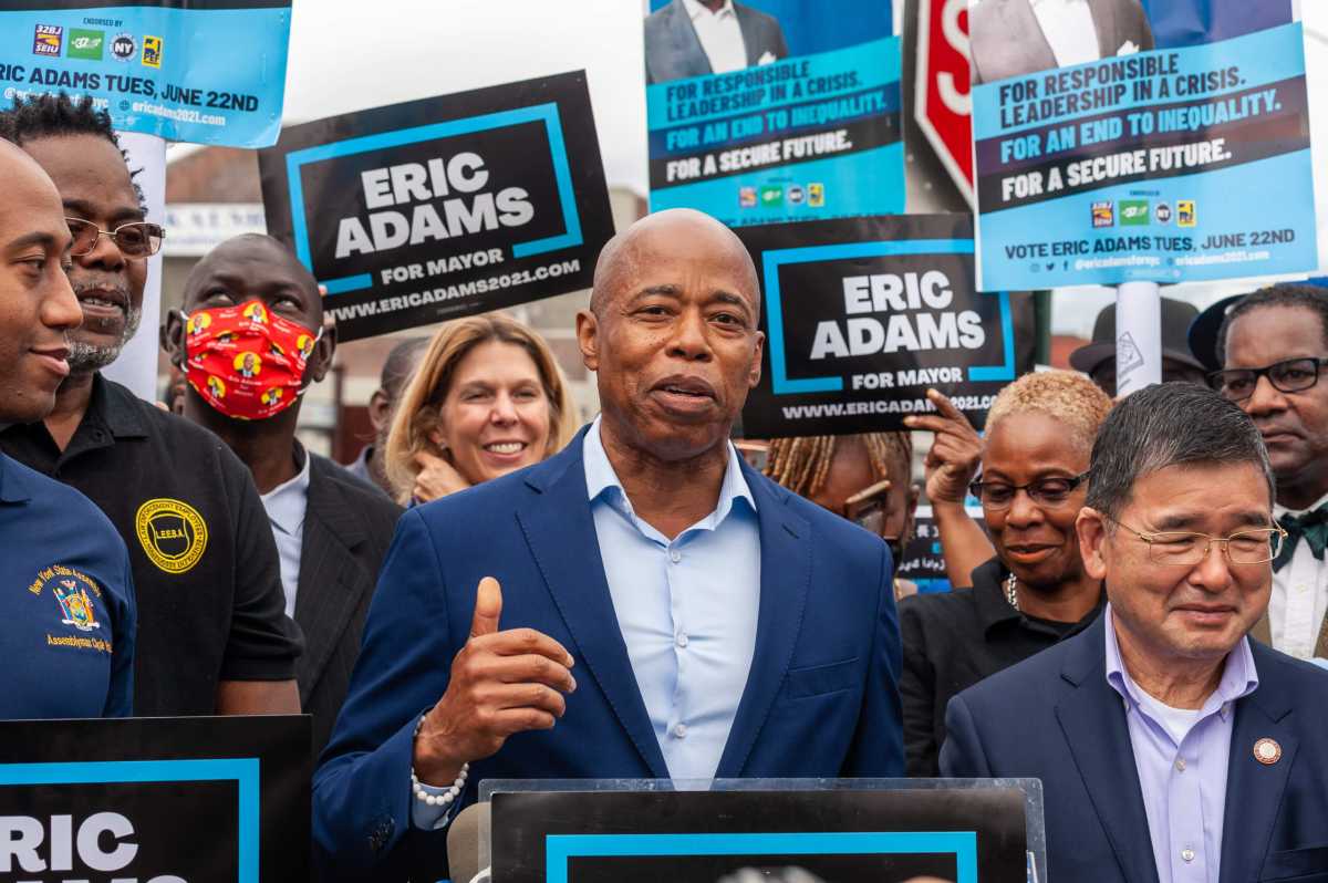 Eric Adams stands with city workers demanding racial and gender pay equity