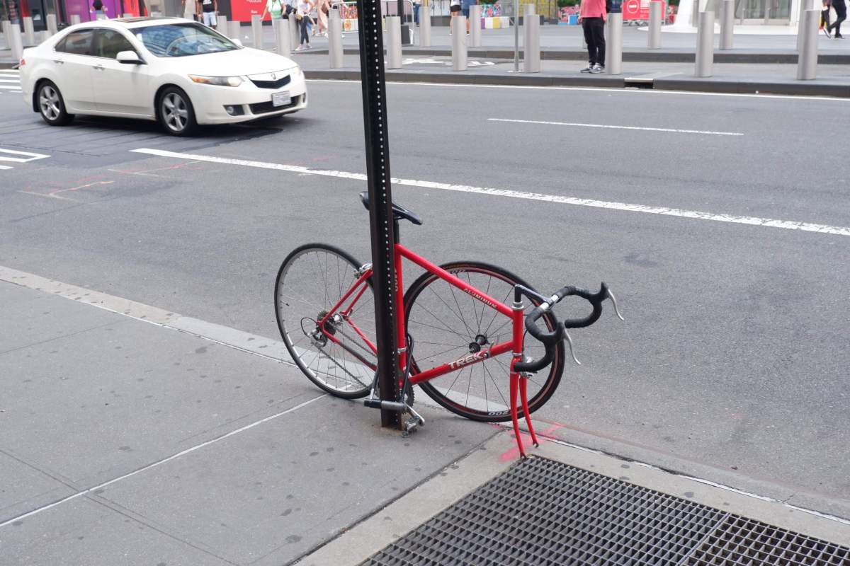 A bike locked up at a street