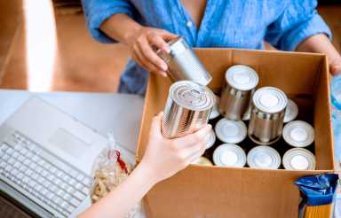 Cardboard Box packing with canned food donations