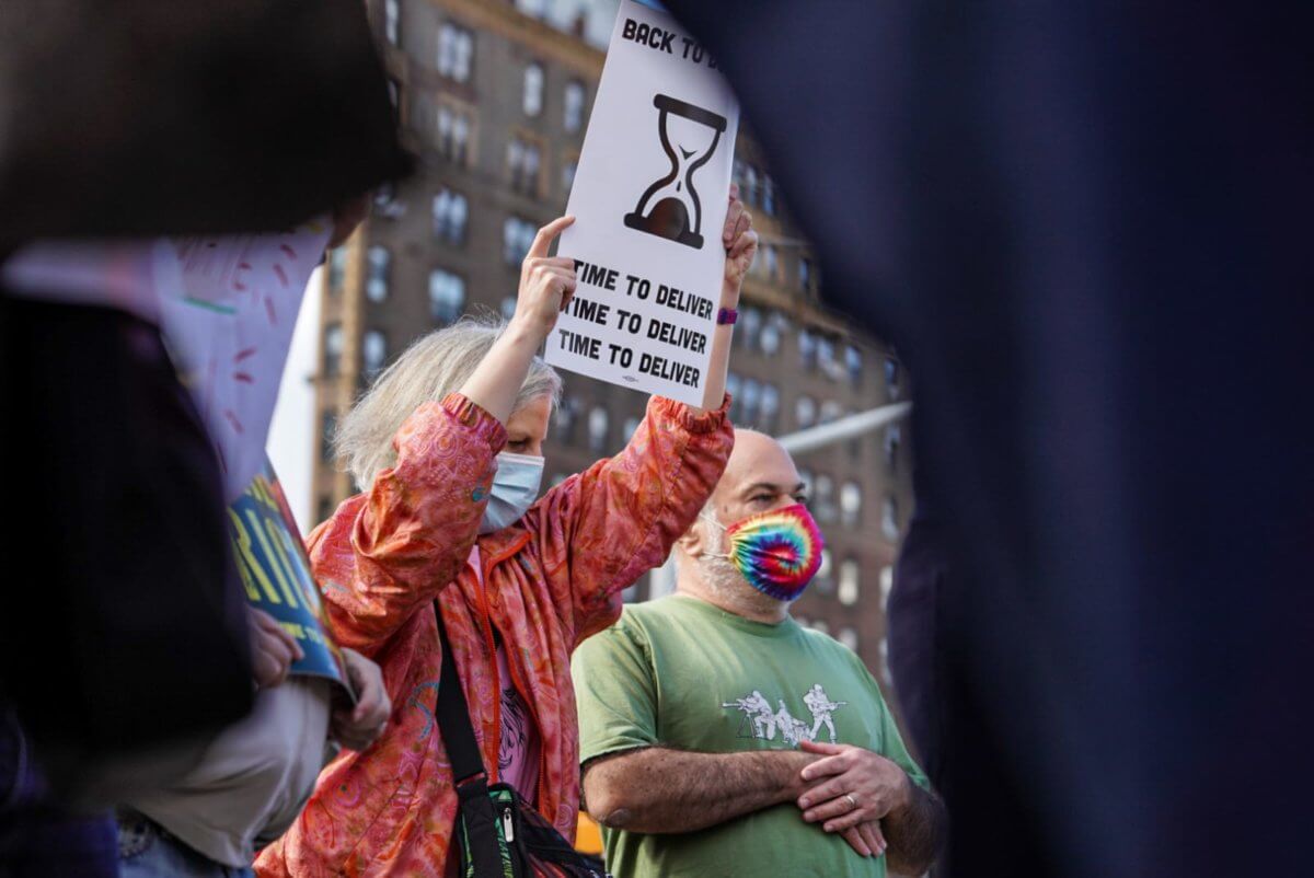 Senator on the line: Brooklyn rallygoers make public and literal call to Schumer demanding progressive action 6
