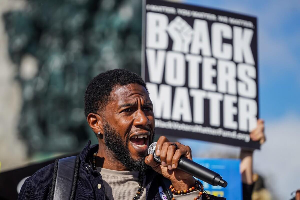 Senator on the line: Brooklyn rallygoers make public and literal call to Schumer demanding progressive action 8