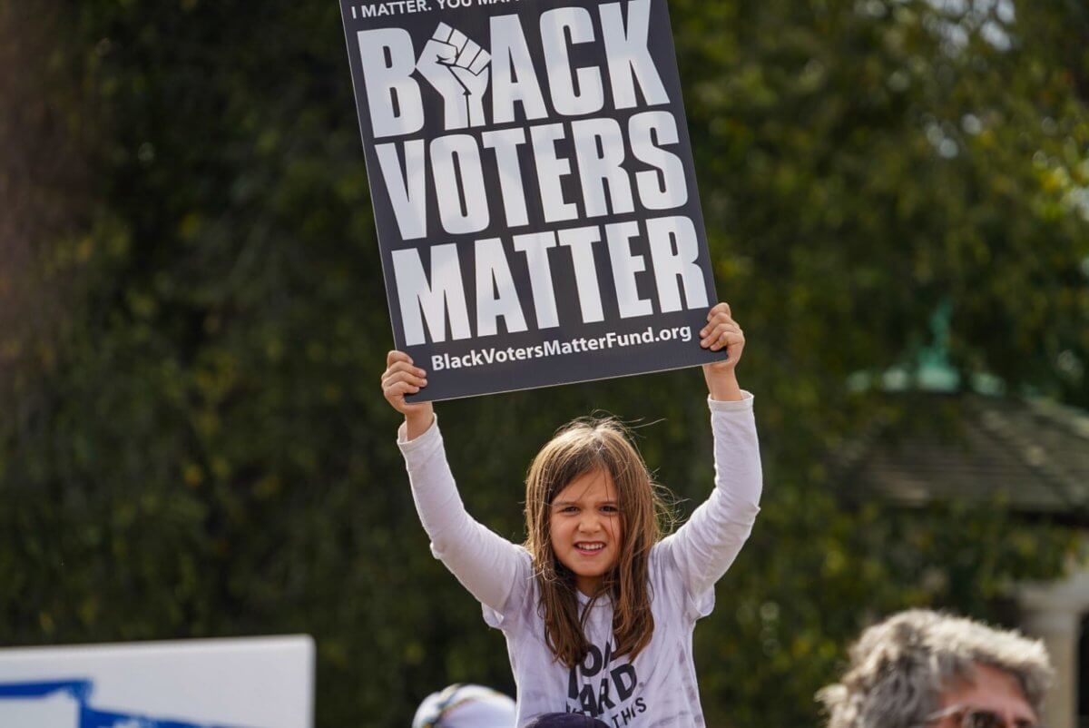 Senator on the line: Brooklyn rallygoers make public and literal call to Schumer demanding progressive action 7