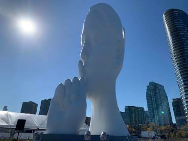 "Water Soul" sculpture by artist Jaume Plensa on Newport Pier.