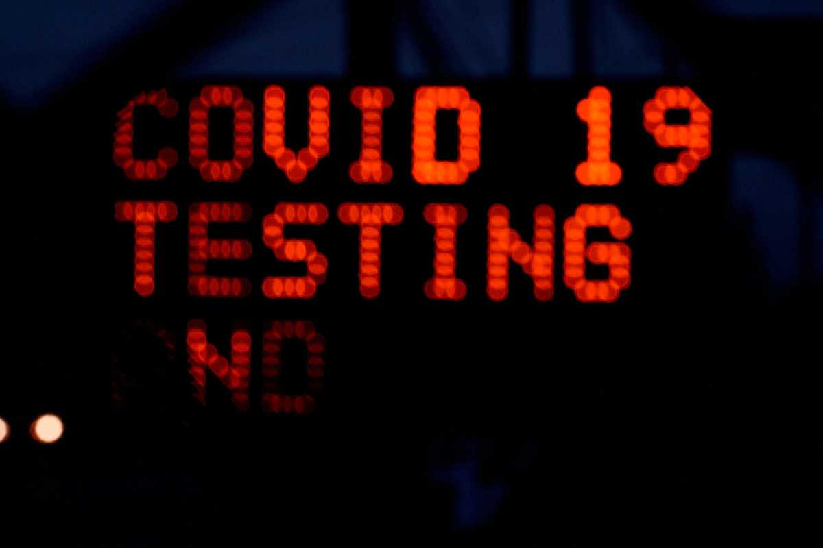 FILE PHOTO: Long lines for COVID-19 testing form at Indianapolis Motor Speedway