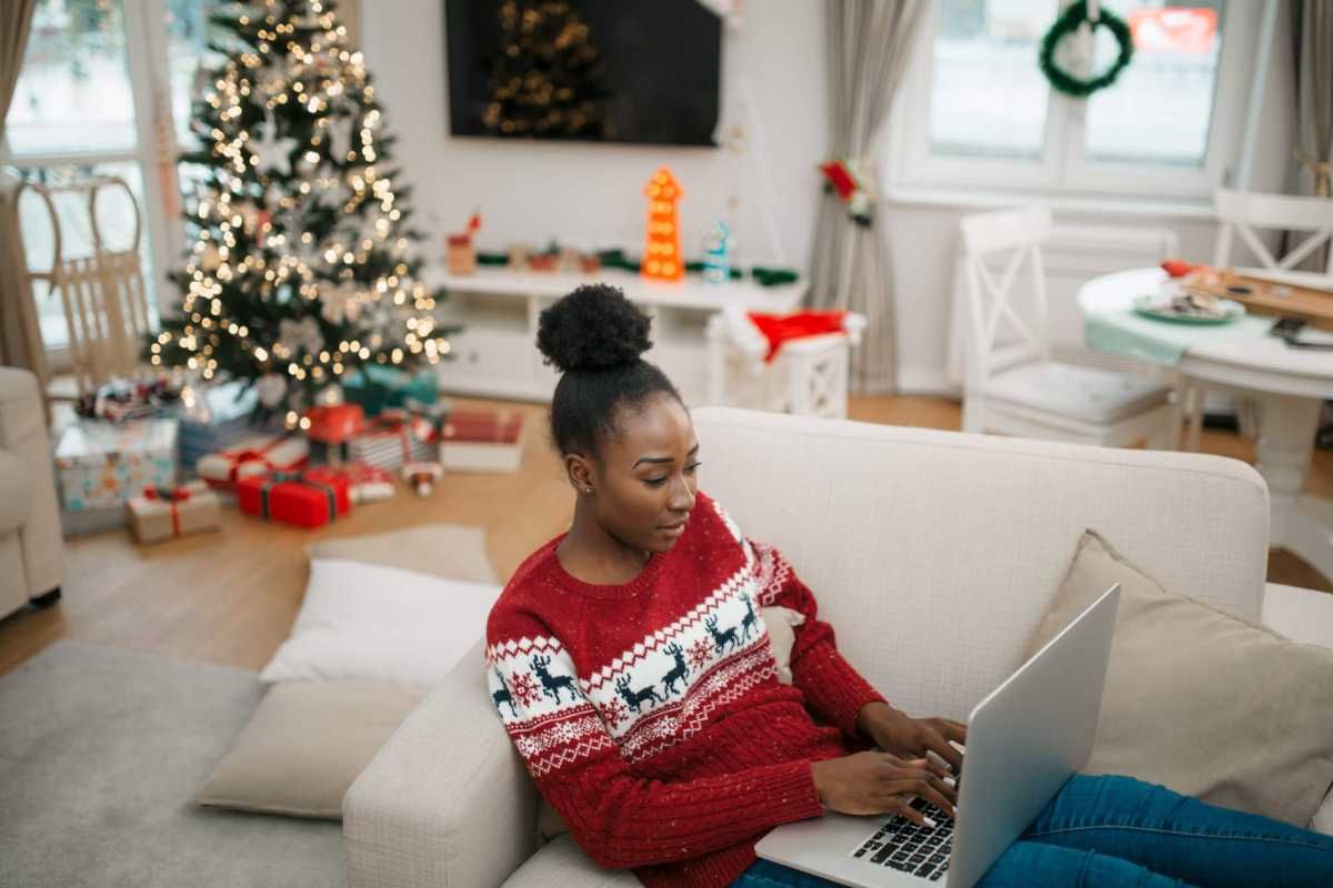 Young African American female student working from home