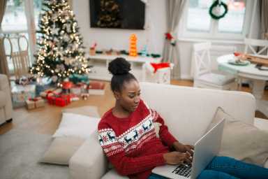 Young African American female student working from home