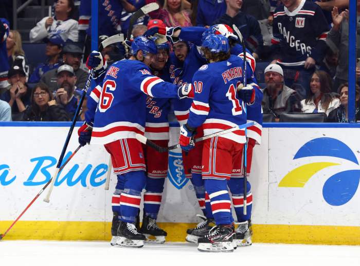 Rangers center Mika Zibanejad celebrates with left wing Chris Kreider after scoring the game winning goal against the Tampa Bay Lightning.