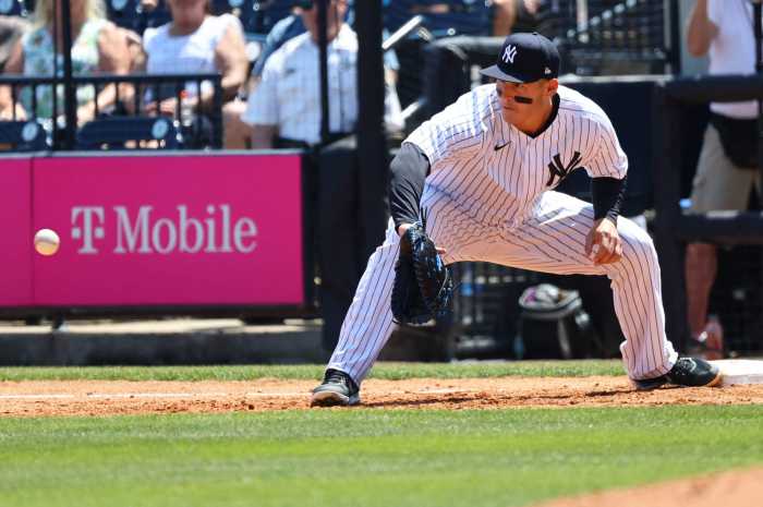 Sign-stealing Yankees outfielder Joey Gallo catches a ball at first during the third inning against the Detroit Tigers.